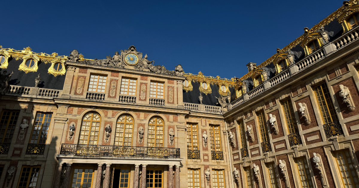 the exterior of the Palace of Versailles.