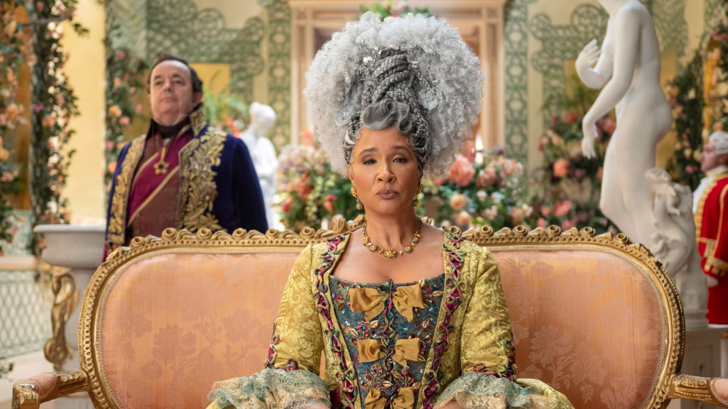 Hugh Sachs as Brimsley and Goulda Roushevel as Queen Charlotte in Bridgerton Season 4. 